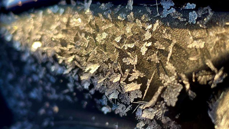 A closeup picture of icy snowflakes